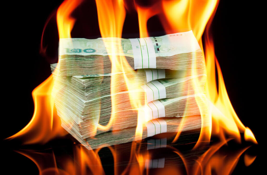 Thai money bill on fire with black background